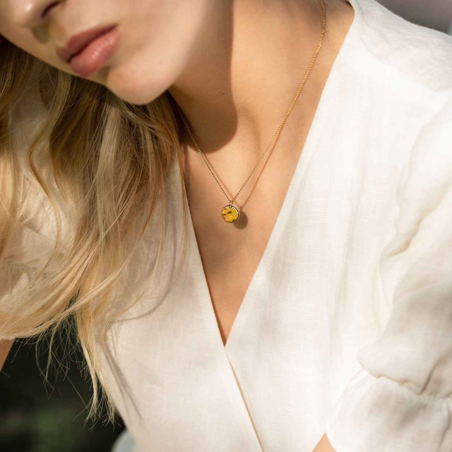 Hammered disk pendant necklace