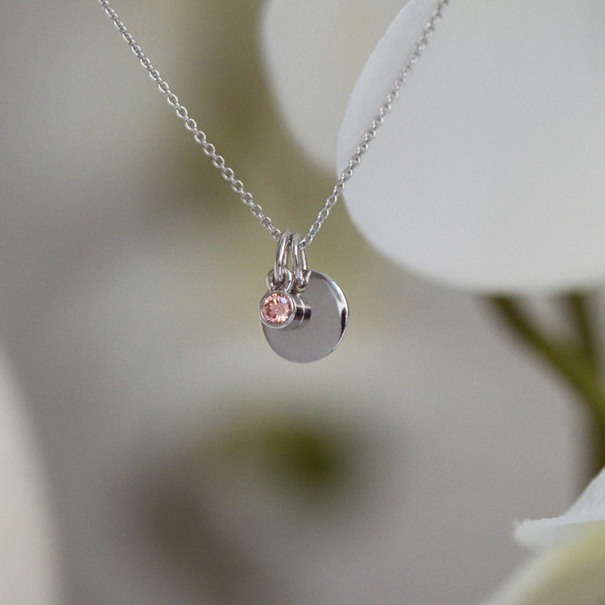 Smooth disk and diamond necklace