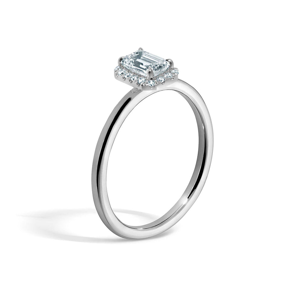 Siro Halo Emerald diamond ring - platinum | Macor Jewellery